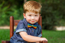 Load image into Gallery viewer, Young child wearing a rainbow bow tie, Photography by https://www.simplycoreyphoto.com/