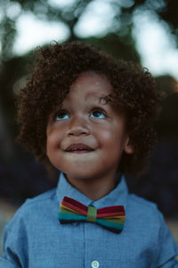 Young Boy Wearing a Rainbow Bow Tie, Photography by https://www.instagram.com/theafricanbazzar/